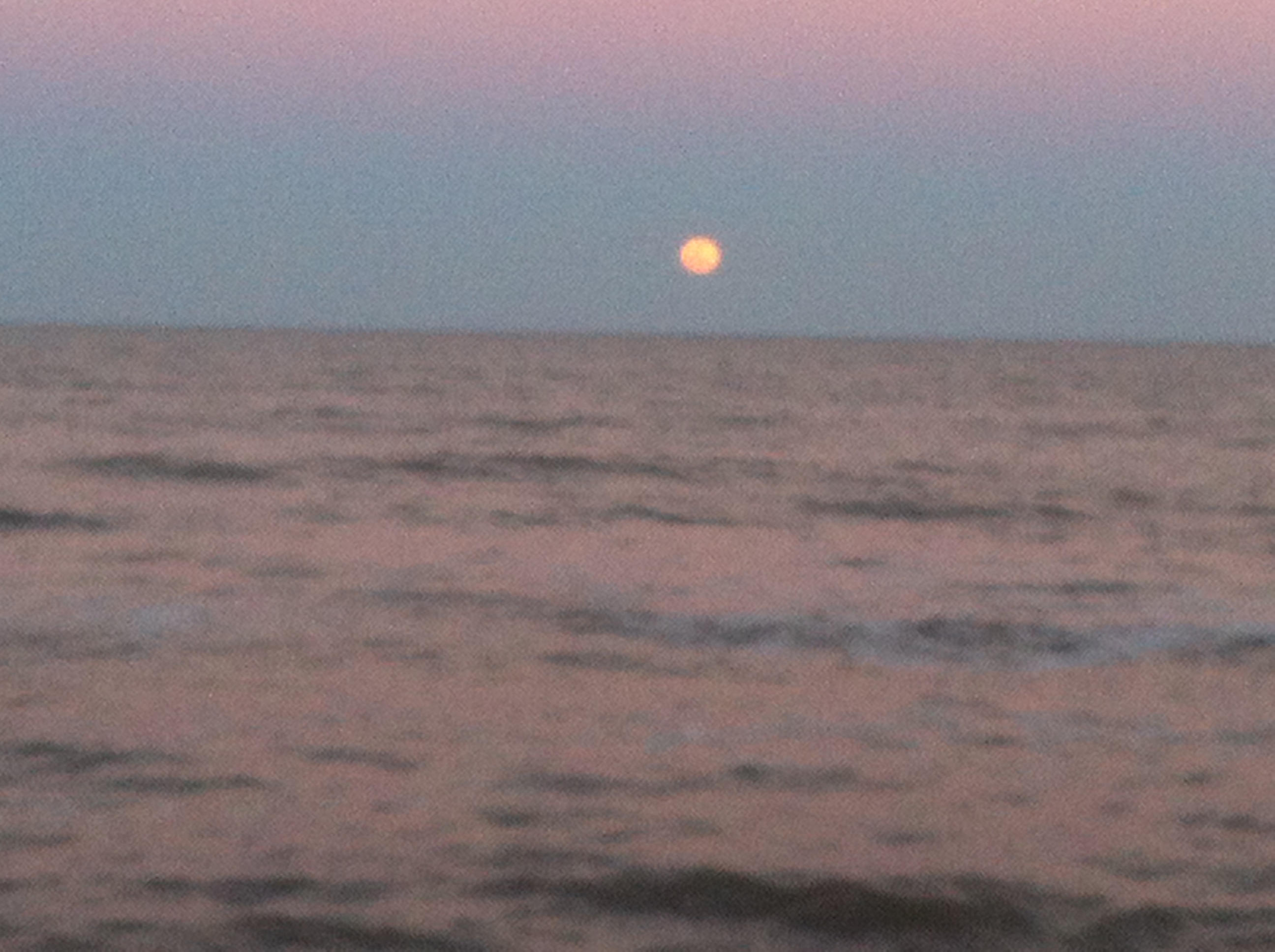 Full moon rising over the Atlantic Ocean at Flagler Beach, Florida.